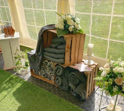 Wooden Crates with Florals and Blankets